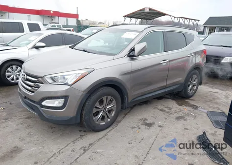 2015 Hyundai Santa Fe Sport 2.4L from USA, damaged, VIN 5XYZUDLB0FG247599